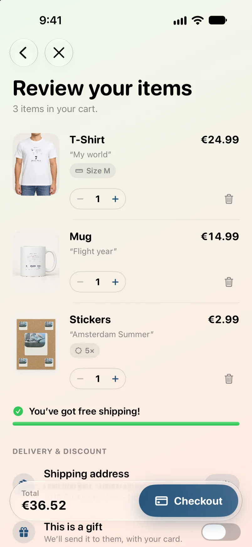 The Studio cart in the app with a T-shirt, a mug and stickers, free shipping and a total of €36.52